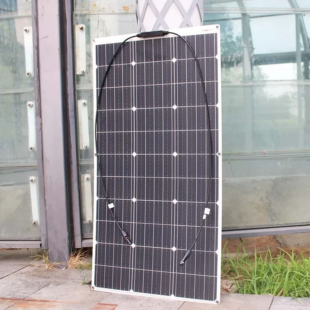 Flexible campervan solar panel with attached MC4 cables for off-grid battery charging.